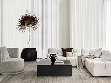 Blinde Design Bloc 40 concrete coffee table grounds a private residence living room with a minimalist modern centrepiece.