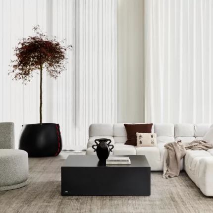 Blinde Design Bloc 40 concrete coffee table grounds a private residence living room with a minimalist modern centrepiece.